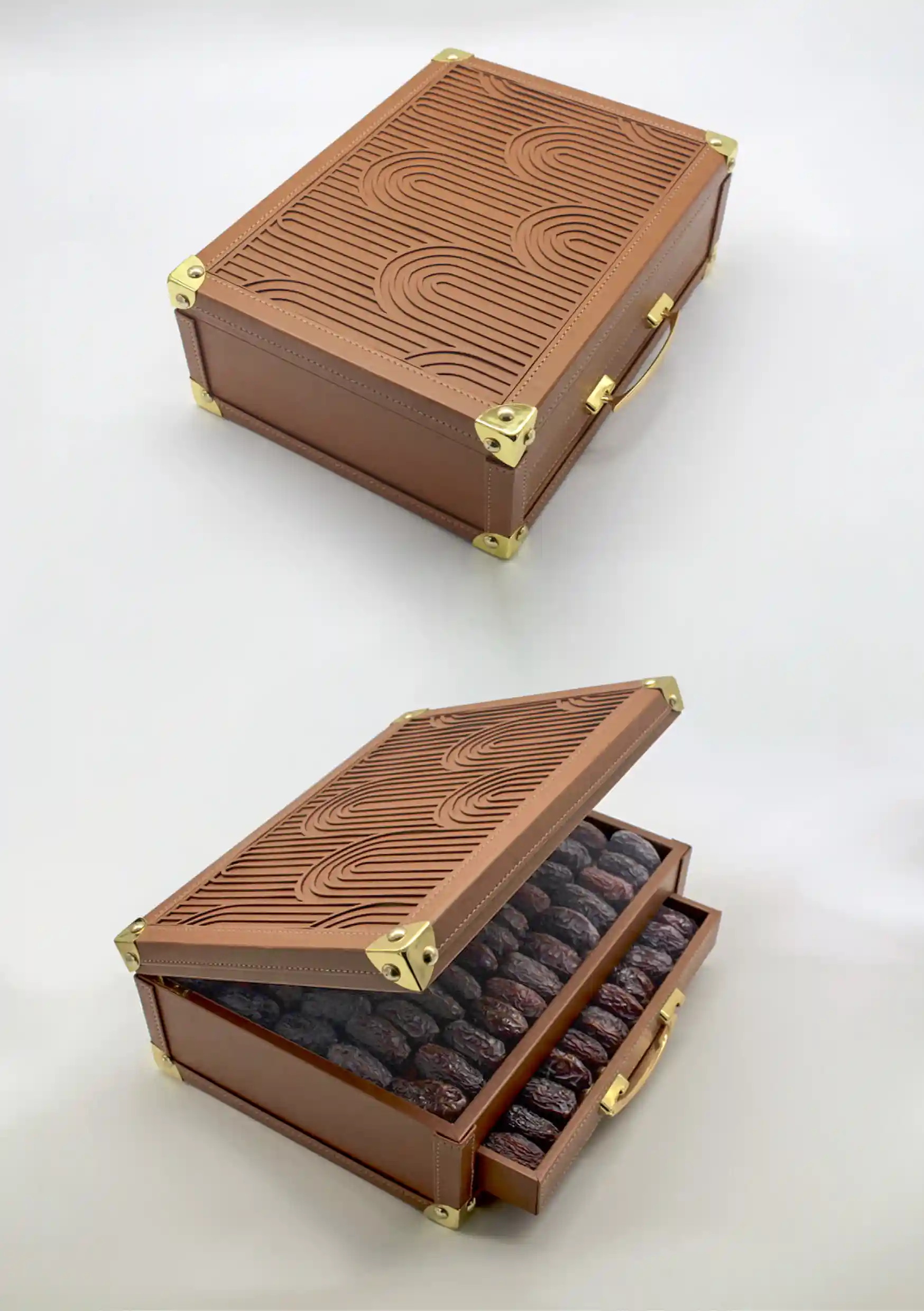 Brown leather date box with a wave-patterned lid, gold metal corner accents, and two layers of premium dates.