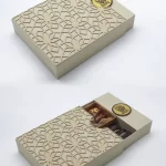 Beige drawer-style Ramadan gift box with a floral laser-cut pattern, partially opened to reveal assorted premium dates