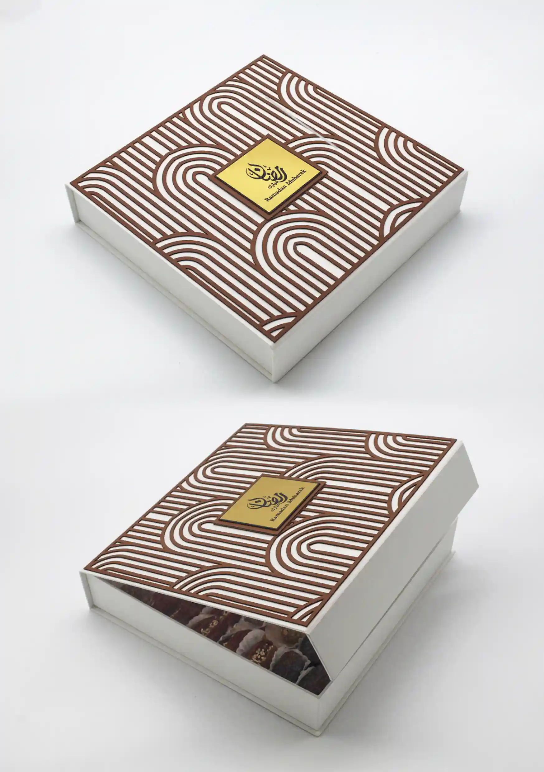 White Ramadan gift box featuring a layered arched-line pattern in brown, opened to display an assortment of luxury dates