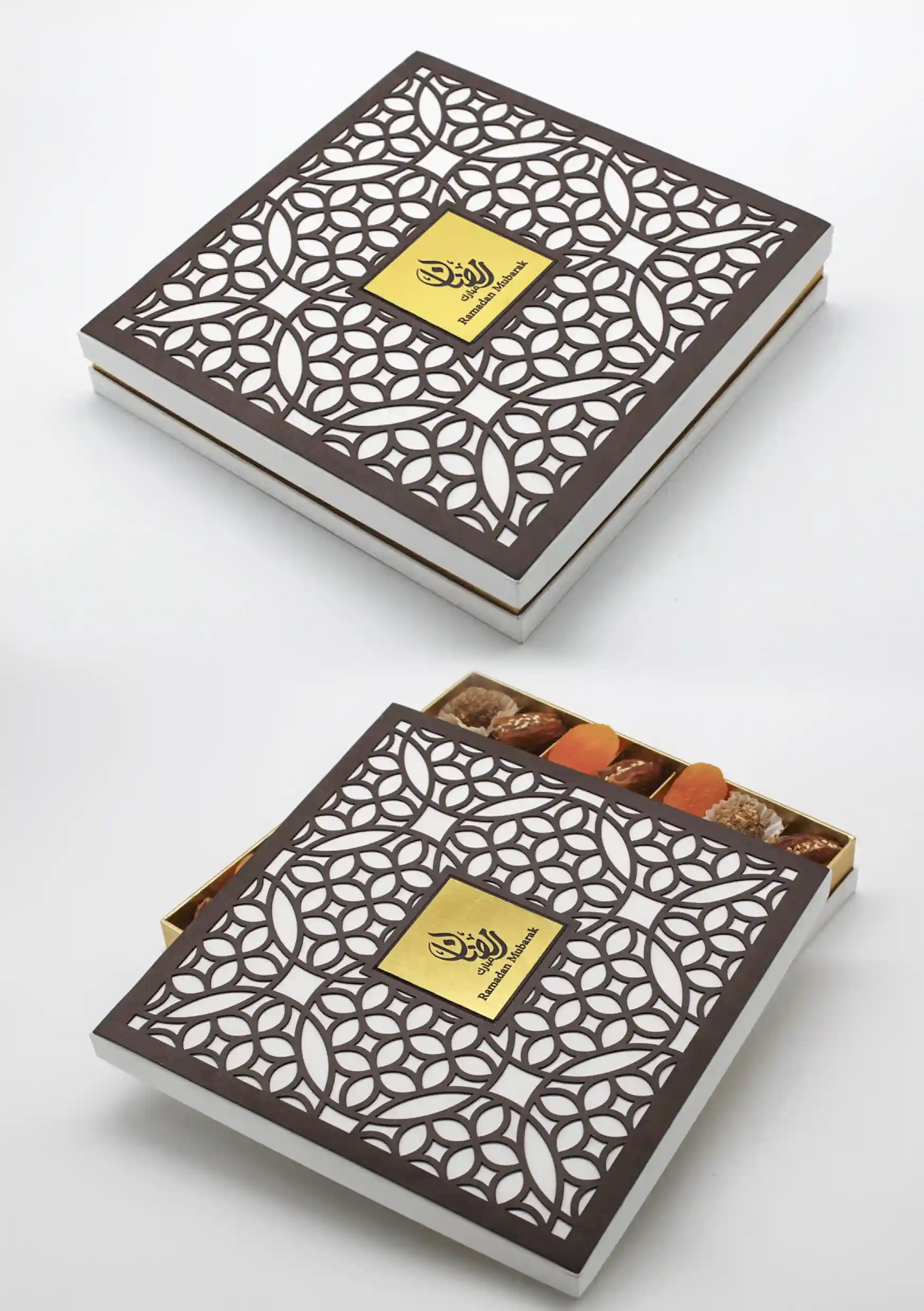 White Ramadan box with a dark brown lattice-cut lid, opened to show dried apricots and premium dates inside