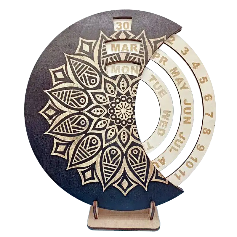 A moon-shaped wooden perpetual calendar decorated with an intricate mandala pattern, displaying dates, months, and weekdays.