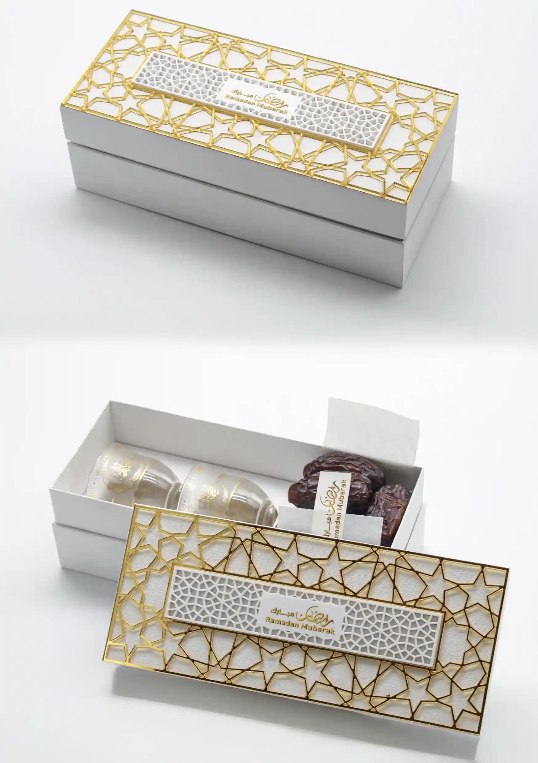 White rectangular gift box topped with a gold star-lattice frame, featuring Arabic coffee cups and premium dates inside