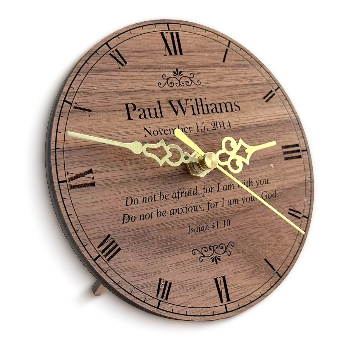 engraved-wooden-desk-clock A wooden desk clock with roman numerals, gold hands, and custom text