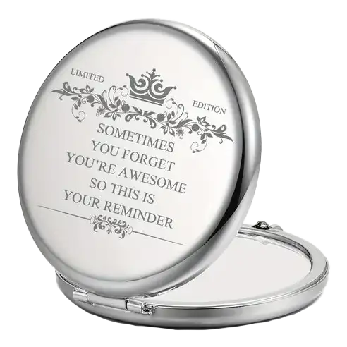 Round silver compact mirror with an ornate design and an inspirational engraved quote on the lid. Gifts for Women
