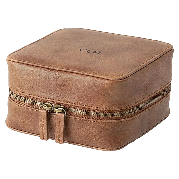 Square leather travel case with dual zippers and a small monogram on the lid Engraved gifts for men