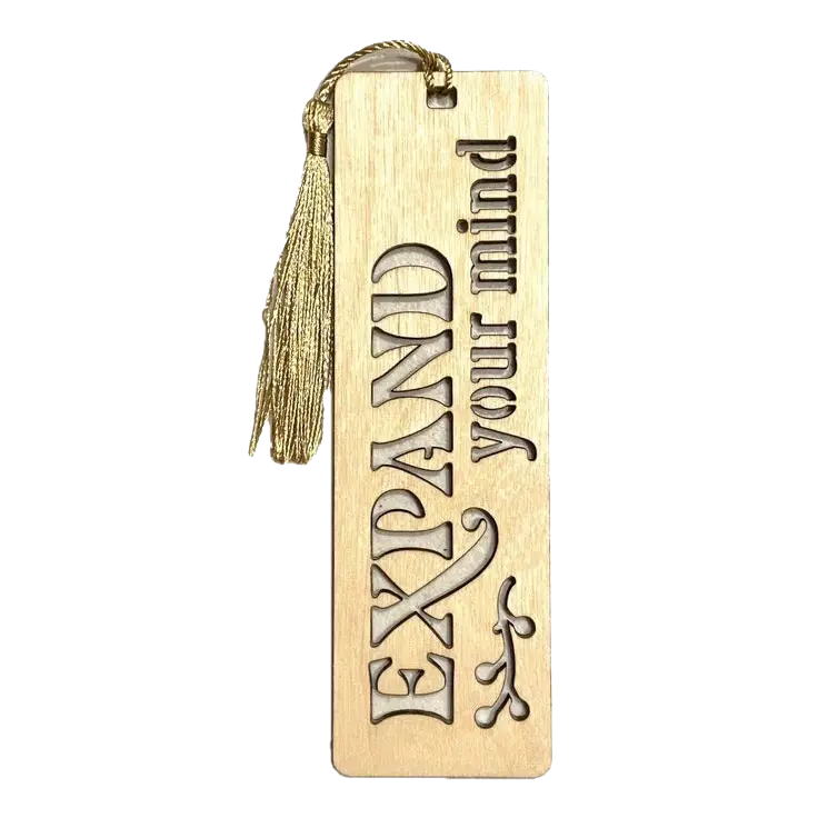 Metal bookmark laser-cut with the phrase ‘Expand your mind’ and featuring a gold tassel