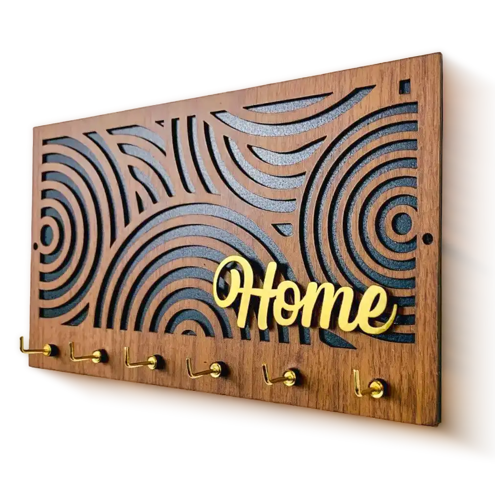 A rectangular wooden key hanger with swirling cutout patterns and the word ‘Home’ in gold, displayed alongside red roses.