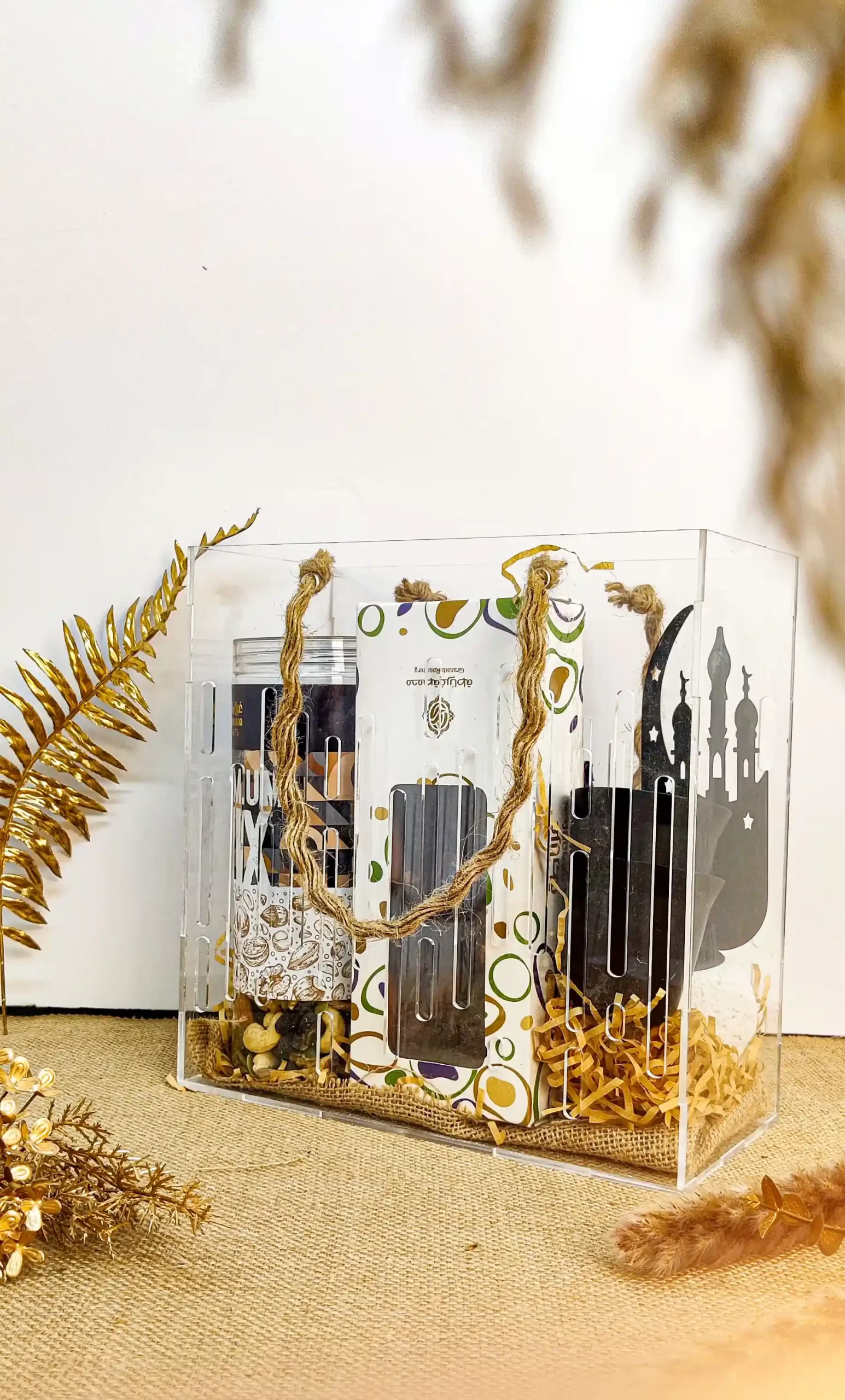 4 Regal Reflection Ramadan Gift Hamper Regal Reflection, featuring mix nuts, premium dates, Bakhoor burner, stainless steel coffee cups, and Turkish coffee