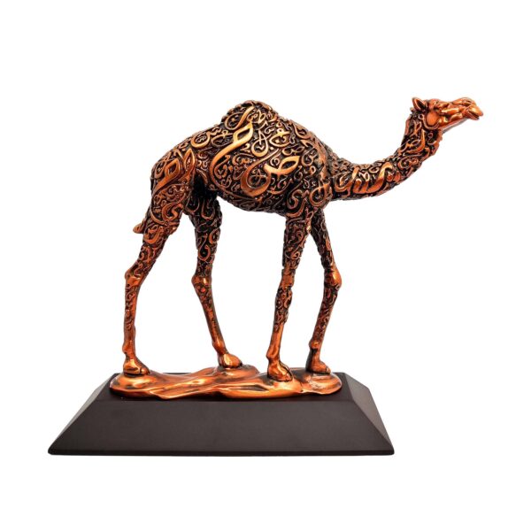 Antique bronze camel sculpture with intricate Arabic calligraphy on body, standing on a flat base.