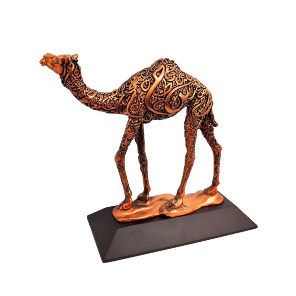 Antique bronze camel sculpture with intricate Arabic calligraphy on body, standing on a flat base.