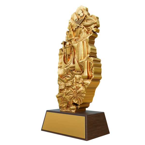 Qatar map sculpture in gold with 3D bas-relief landmarks like Al Zubarah Fort, Katara Towers, and Museum of Islamic Art.