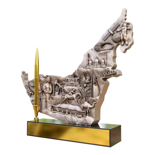 3D UAE map sculpture with seven emirates’ landmarks in antique finish, gold pen holder, and black base