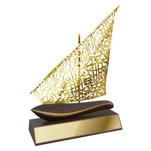 Gold calligraphy dhow sculpture on wood-effect resin base with Sheikh Zayed poem