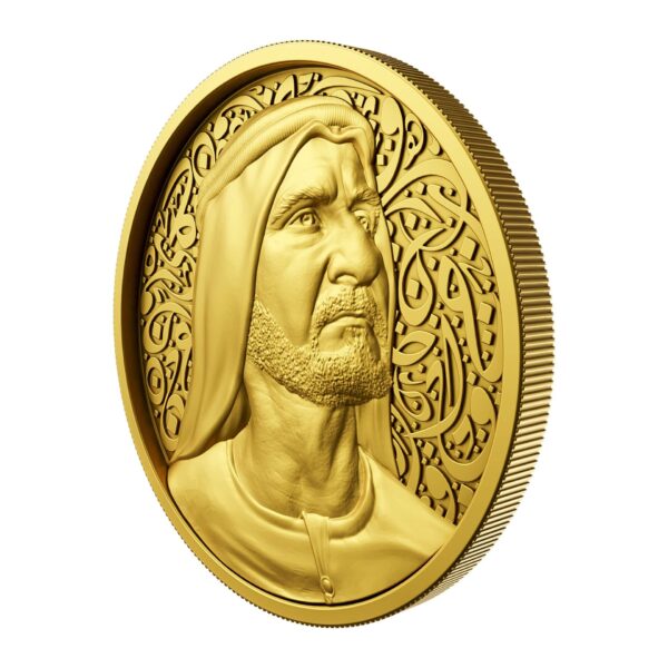 Gold coin with bas-relief of Sheikh Mohammed bin Rashid Al Maktoum on Arabic calligraphy background