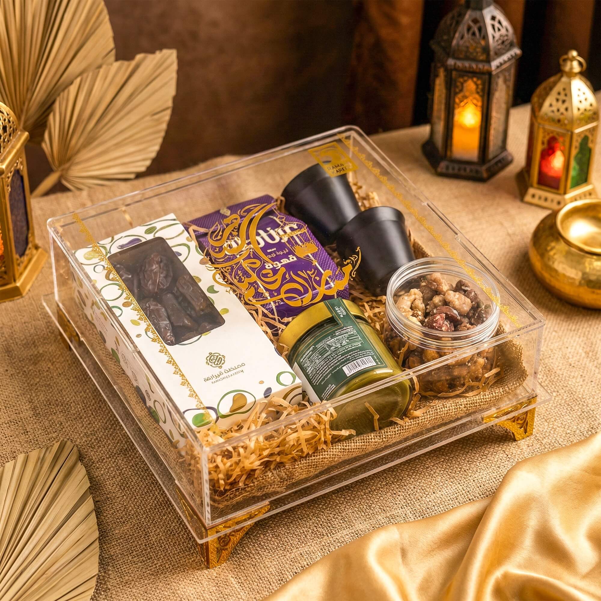 Heavenly Delights Ramadan Gift Hamper showcasing premium dates, Turkish coffee, stainless steel coffee cups, mix nuts, and pistachio cream spread